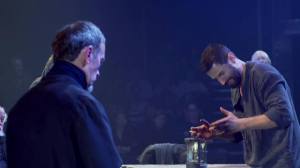 Reverend Hale (Adrian Schiller) witnesses John Proctor's (Richard Armitage) frustration with his inability to remember the last of the Ten Commandments, in Act Three of The Crucible. Screencap.