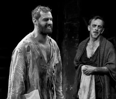 Hale (Adrian Schiller) looks on in pain as Proctor (Richard Armitage) rips his confession in half, in Act Four of The Crucible. Source: Unknown